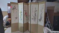 Full frontal view of six-panel folding screen showing overall design and condition