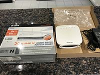 D-Link Xtreme N Gigabit Router in box with packaging and product visible