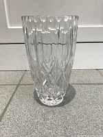 Full view of the clear crystal vase showing cut design and thickness