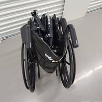 Top-down view of wheelchair folded