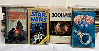 Overview of first 4 books including Star Wars by George Lucas, 2001: A Space Odyssey and Imperial Earth by Arthur C. Clarke, and Splinter of the Mind's Eye by Alan Dean Foster.