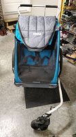 Front view of assembled Thule Coaster XT with jogger wheel attached and handlebar visible