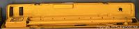 Yellow hard plastic carrying case closed with latch