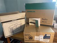All three item boxes displayed on table