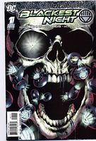 Photo showing the cover of Blackest Night #1 comic book with prominent skeletal face and glowing lantern symbols.