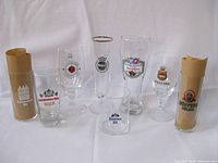 Full view of eight German beer glasses with some in original packaging.