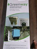 Front view of the Greenway drying rack packaging showing images of the rack in use and product information.