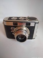 Photo of the Kodak Signet 40 camera showing front view with lens and rangefinder windows.