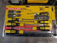 Fuller 34-piece screwdriver set in original blister package showing various layers and types of screwdrivers and bits.