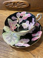 Cup and saucer set paired, front angle