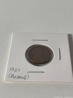 Obverse view of the 1920 Lincoln Wheat Penny showing the profile of Abraham Lincoln and the year 1920 with no mint mark.
