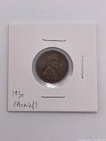 Front side of 1950 Lincoln Wheat Penny showing Abraham Lincoln and year 1950.