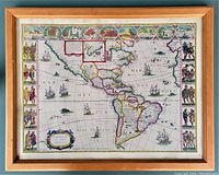 Frontal photo of the framed reproduction map showing the full wooden frame and map details.