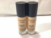 Front view of two Bare Minerals BarePro liquid foundation bottles, shades 02 Ivory and 0.5 Porcelain, 30ml each.