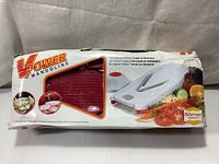 Photo of retail box showing Borner V Power Mandoline branding and product image