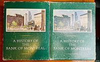 Front covers of two hardcover books titled 'A History of the Bank of Montreal' showing green cloth binding with some wear.