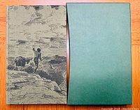 Book and slipcase showing the green slipcase with a black line drawing of a man and a donkey on a path.