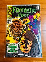 Front cover of Fantastic Four #78 comic book showing main characters and comic title.