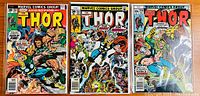 Front covers of three Thor comics (#252, #257, #266) shown side-by-side displaying cover art and title.