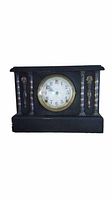 Front view of the black wood cased Sessions clock with circular clock face and decorative turned columns.