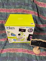 Box of Little Tikes itikes I Discover Microscope educational toy with large front image of the microscope and product features.