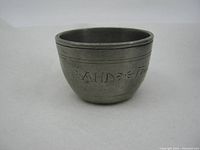 Front side showing etched letters 'AHD'