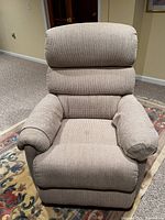 Front view of light grey La-Z-Boy recliner chair showing padded armrests, cushioned backrest, and seat