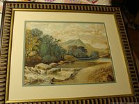 Framed watercolor landscape painting showing full artwork and frame.