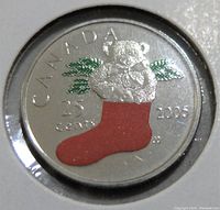 Close-up image showing the coloured design of the teddy bear in a stocking, with clear year 2006 and text CANADA and 25 cents.