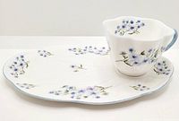 Tea cup and snack plate together showing Blue Rock floral pattern, shape, and size relation