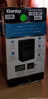 Danby DDR50B1BDB dehumidifier box showing model, capacity, and features.