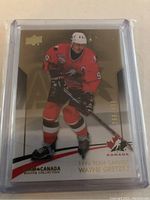 Front of Wayne Gretzky hockey card showing player in 1996 Team Canada uniform with card number 286/499.
