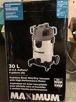 Front of the box showing the Maximum 30L Stainless Steel Wet/Dry Shop Vacuum with high performance motor specifications.