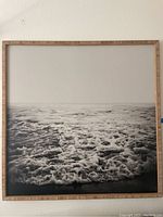 Full view of the 30x30 inches wooden framed print showing the sea foam and waves.