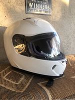 Front angle view of white Fly full-face motorcycle helmet with visor closed, showing glossy finish and vent on chin guard.