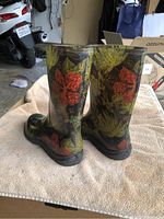 Back view of floral patterned Sloggers rain boots showing design and condition
