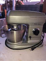Side angle showing the Viking mixer with stainless steel bowl and control dial.