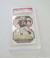 Front of 2021 Panini Prizm Bo Jackson football card graded PSA Gem Mint 10 showing player in Raiders uniform action pose.
