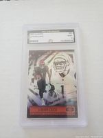 Front of 2021 Panini Illusions Ja'Marr Chase rookie card graded Mint 9 in protective plastic case