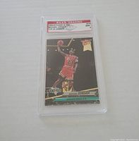 Front view of the graded 1992-93 Fleer Ultra Michael Jordan Top 20 Jammer basketball card in protective case.