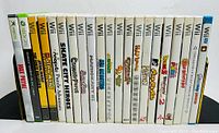 Photo showing the spines of all games in the lot for identification.