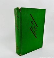 Front cover of green hardcover book 'The Robe' by Lloyd C. Douglas with some spine wear and small edge damage.