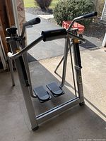 Full view of Pro-Form Air Walker exercise equipment showing frame, handles, and foot pedals.