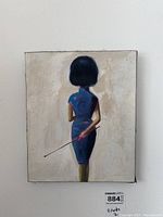 Front view of smaller or larger print showing woman with black bob hairstyle wearing blue dress holding stick behind back.