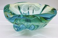 Front view of green and teal Sommerso glass bowl with organic wavy rim