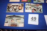 Postcards with whimsical fish themes, including vehicles shaped like fish and fish balloons carrying children.