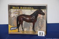 Front view of Breyer "War Admiral" horse model inside original box showing the horse and packaging graphics.