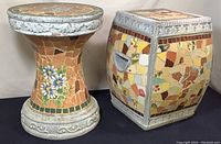 Both mosaic plant stands side by side showing the hourglass and square shapes, tile mosaic and cement details.