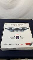Closed box showing UDI R/C Discovery HD+ Upgrade drone U818A model packaging with product image and branding
