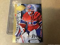 Front view of Carey Price hockey card with autograph, showing player in red Montreal Canadiens uniform and goalie gear.